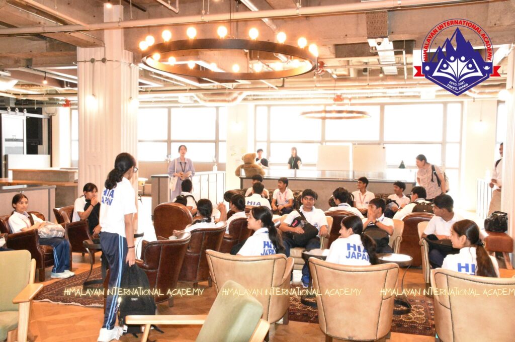 HIA students seated in a university common room during a campus briefing
