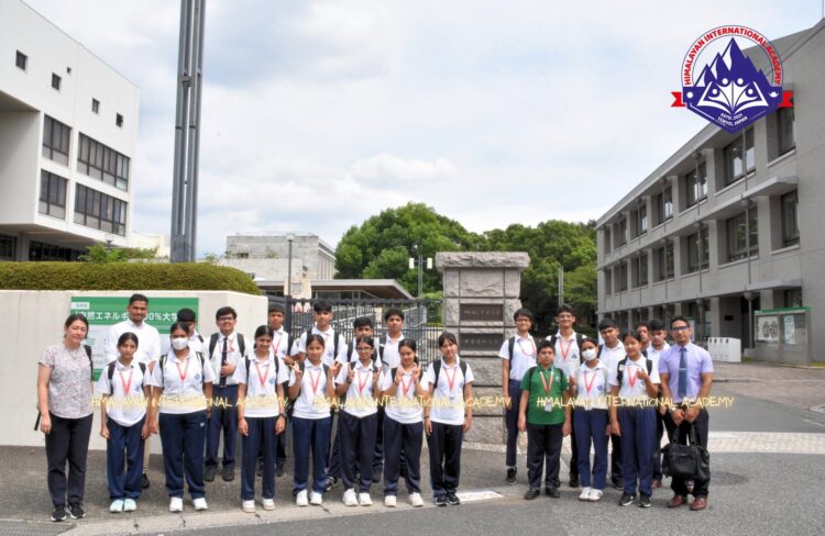 HIA Grade 9 students and teachers outside the entrance of Chiba University of Commerce