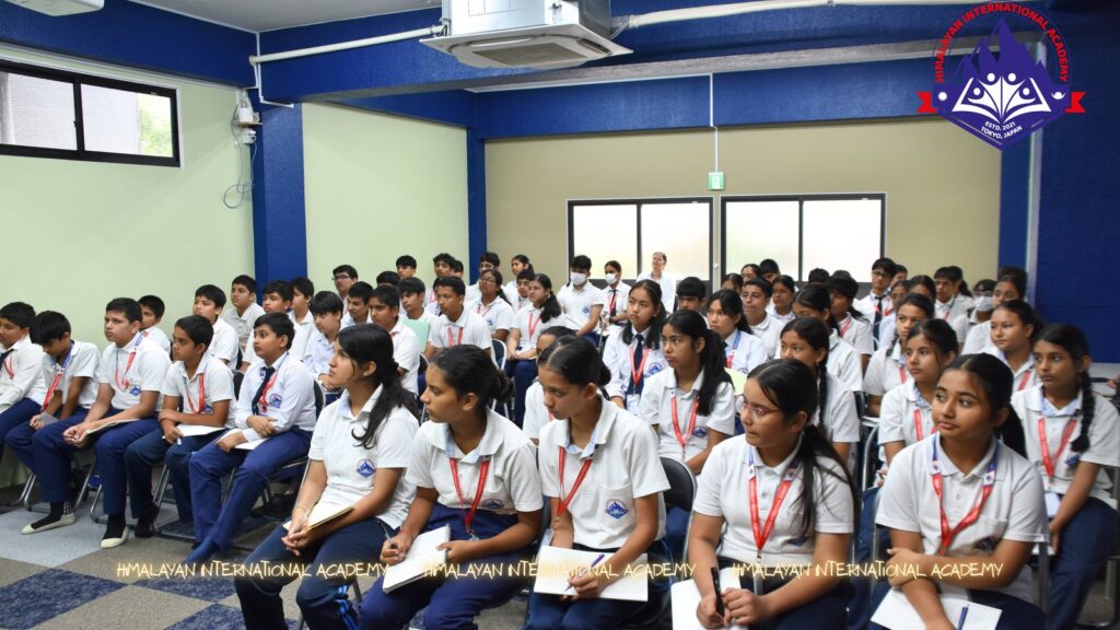 HIA Grade 7 to 9 students listening to the guest lecture